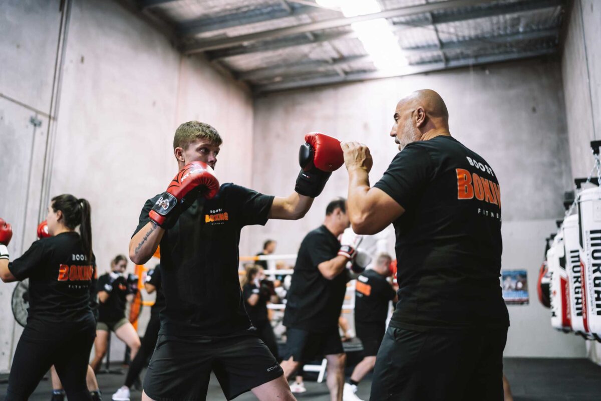 Two males boxing training